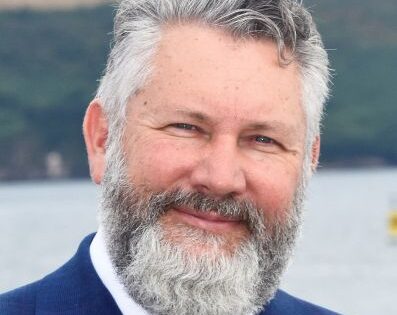 Headshot of Richard May